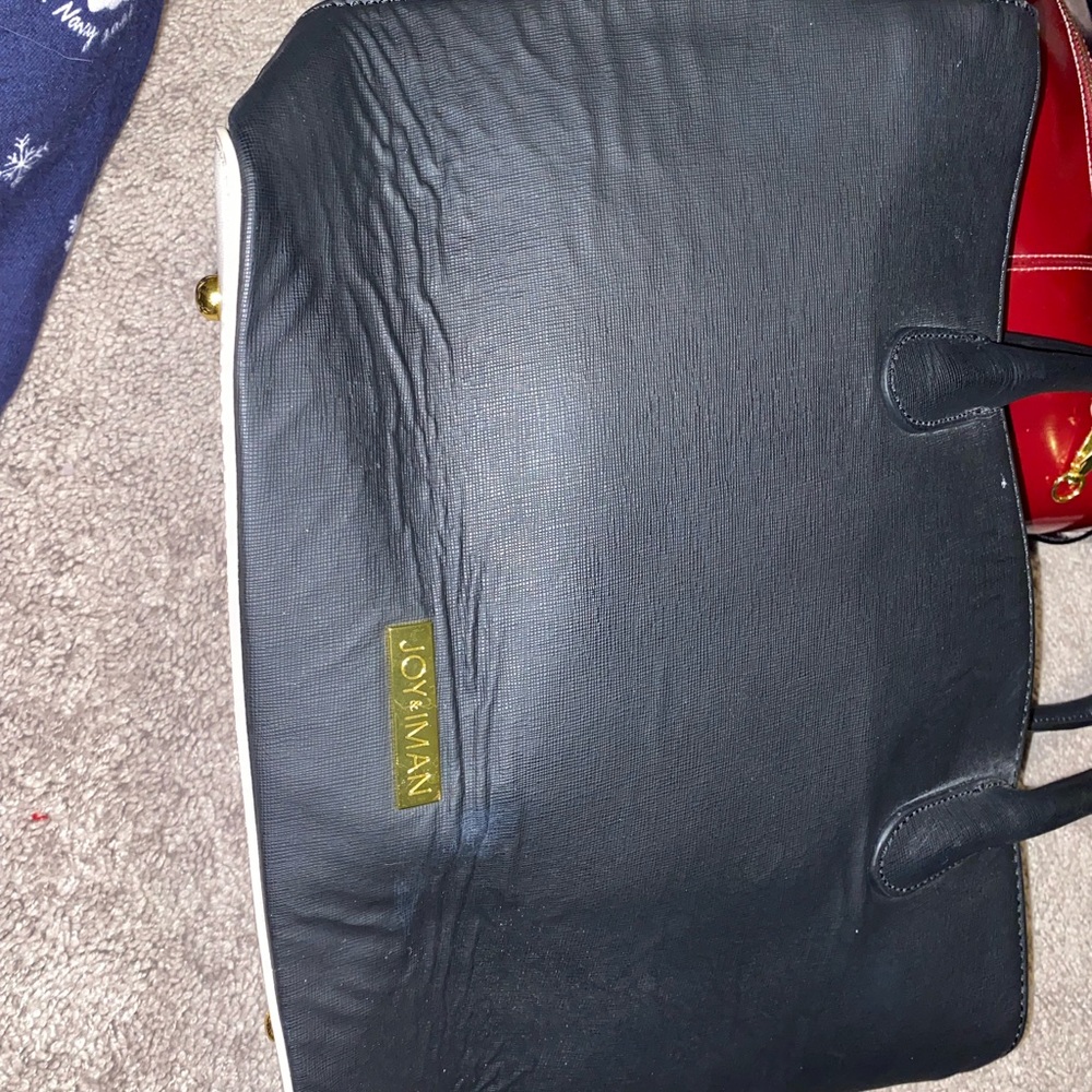 Joy & Iman black bag